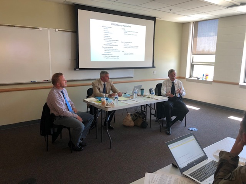 The Firehorse Team—from left, Todd Keil, Erik Doman, Amb. Tim Carney—leads a session on embassy structure for 5th SFAB students.